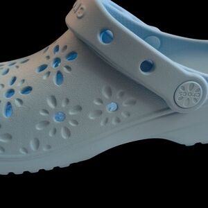 Light Blue Crocs with Floral Cutouts